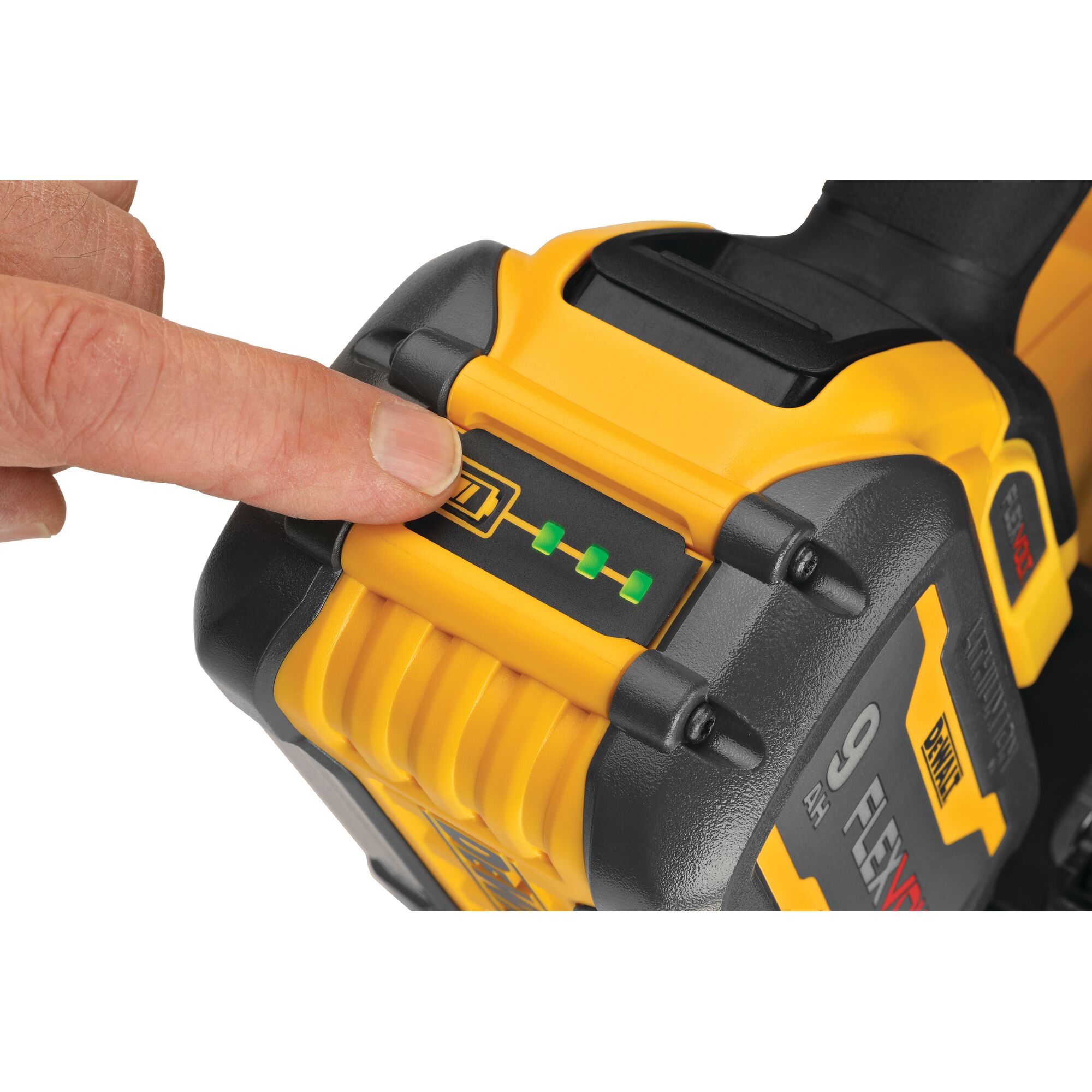 A close-up of a hand pressing the battery indicator button on a yellow and black DEWALT 9Ah FLEXVOLT battery, showing three green lights.