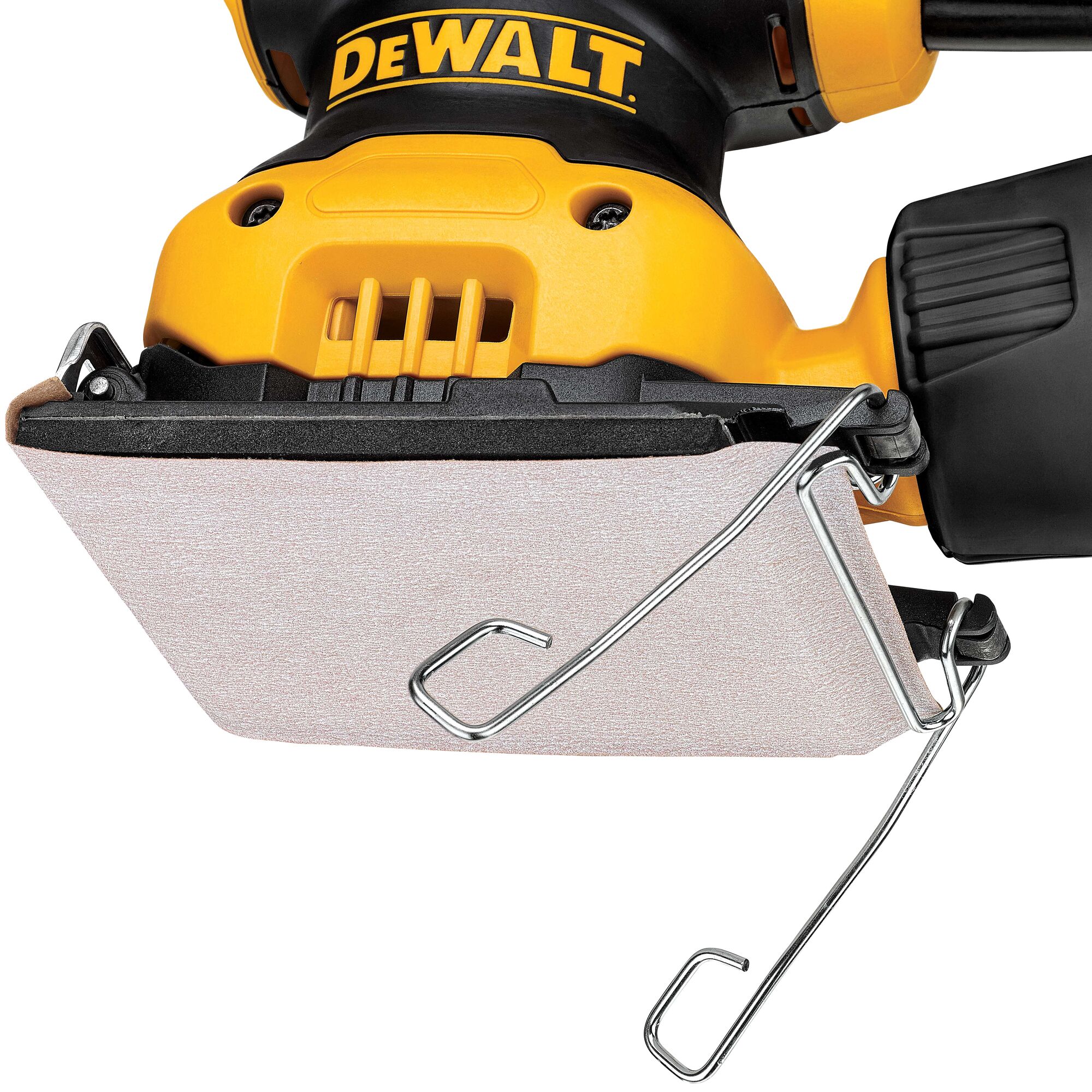 Close-up view of a DEWALT electric hand sander with a rectangular sanding pad attached, featuring metal clips to secure the sandpaper. The tool has a yellow and black design.