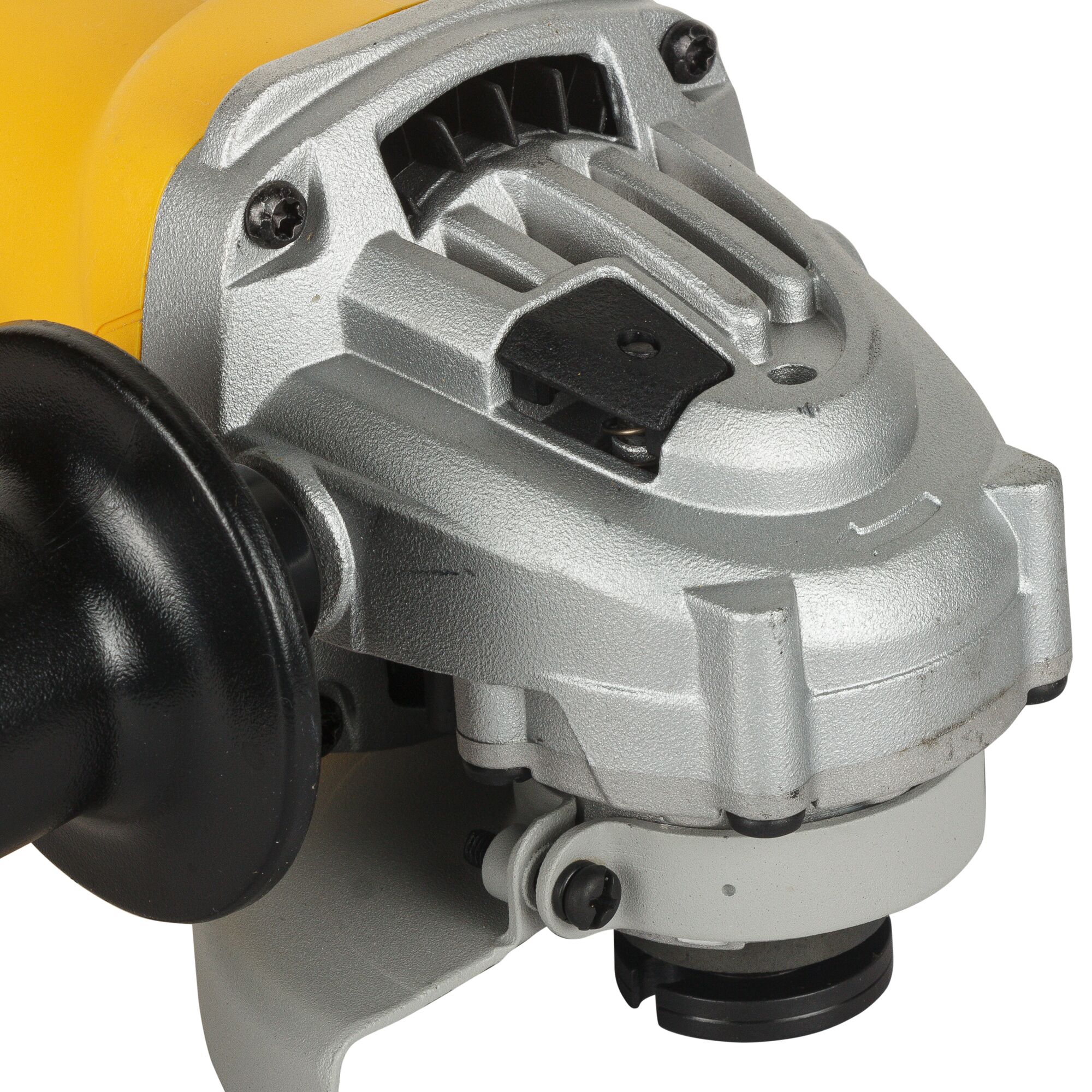 Close-up view of a DEWALT angle grinder, showing the metal body, black handle, and part of the yellow casing.